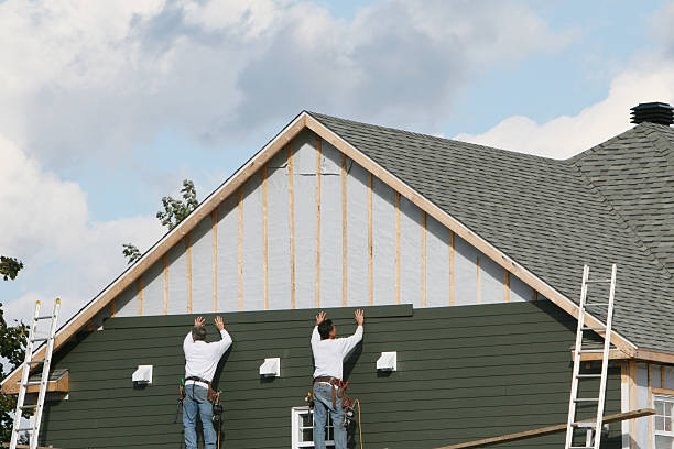 Professional Siding technician working in Williamstown, WV